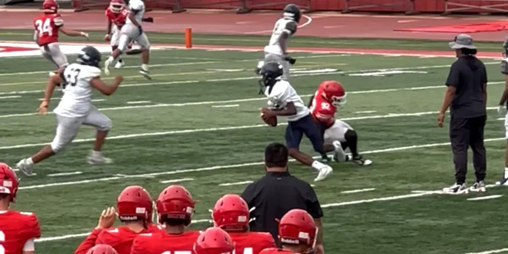 Major Curry baiting and angle breaking a would be pass rusher.