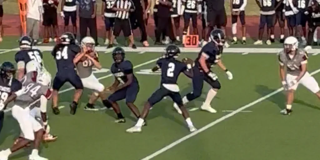 Major Curry sitting in pocket about to make a throw